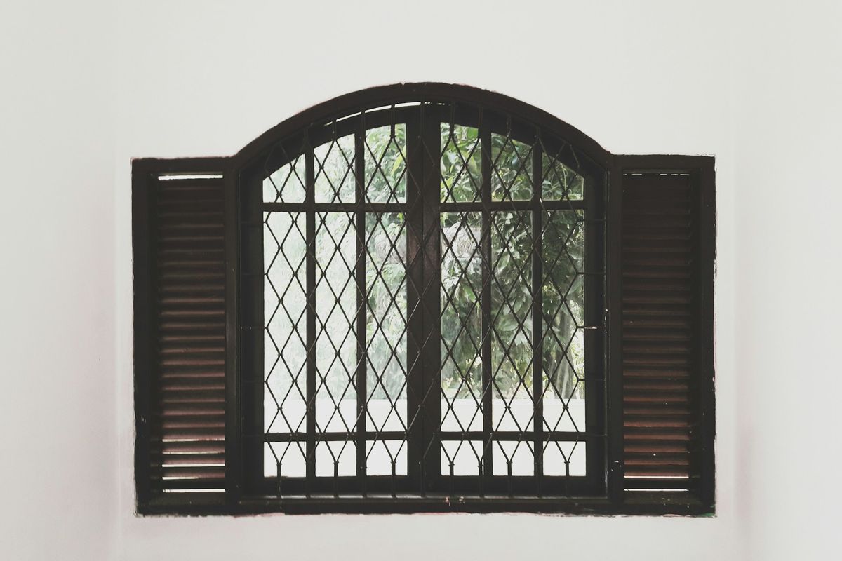 closing black wooden window