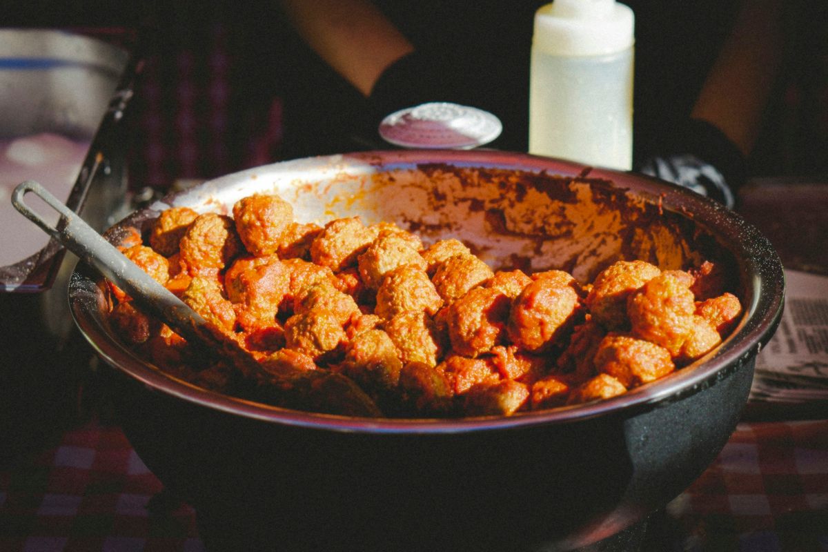 a pan filled with food on top of a table