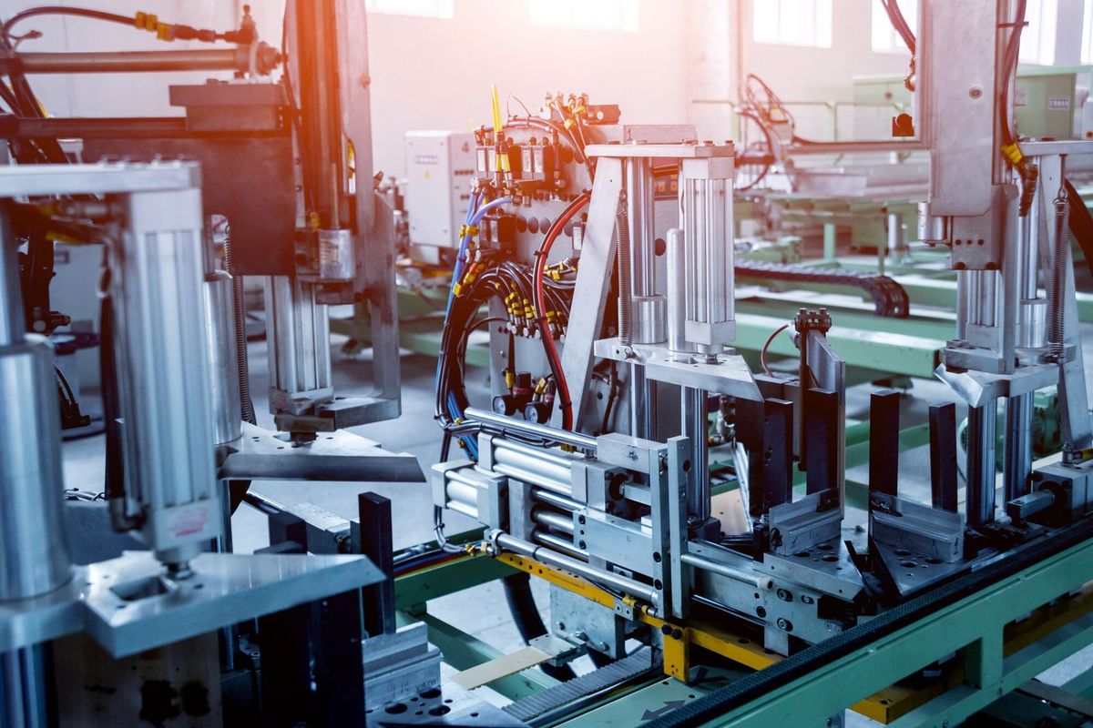 Factory for aluminum and PVC windows and doors production. Details industrial equipment.