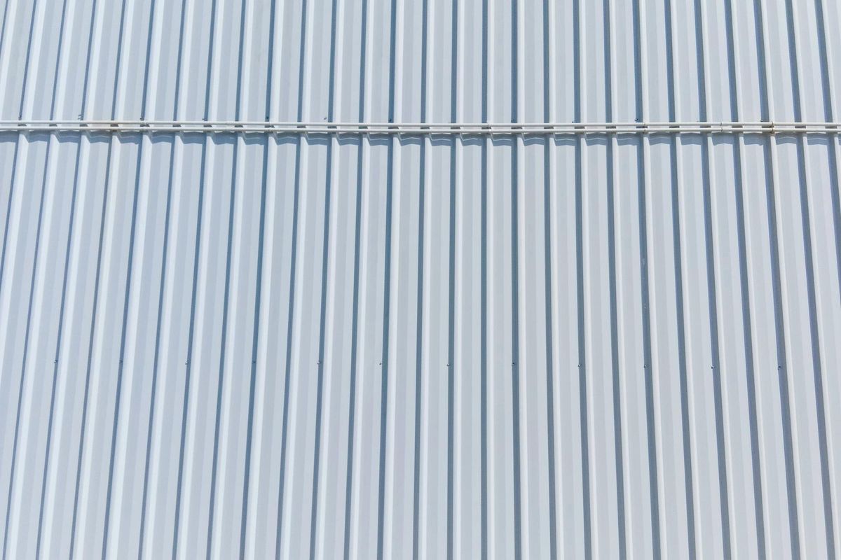 Full frame shot of patterned wallthe steel wall of the building texture background