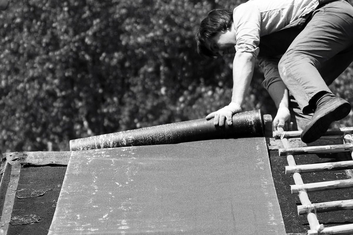 Man in worker's clothes black and white