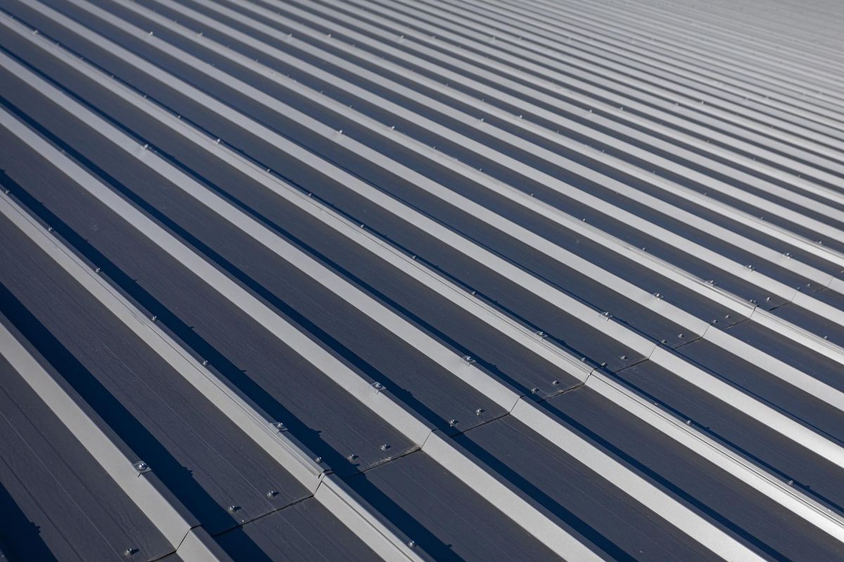 Roof covered with paintcoated trapezoidal sheet in graphite color