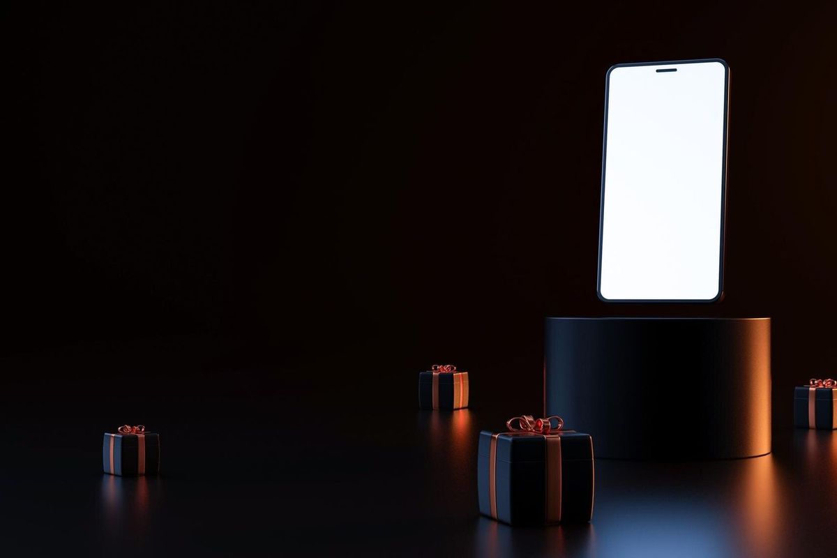 Mockup with a phone on a stand among the gifts a cool orange light in the dark 3D rendering