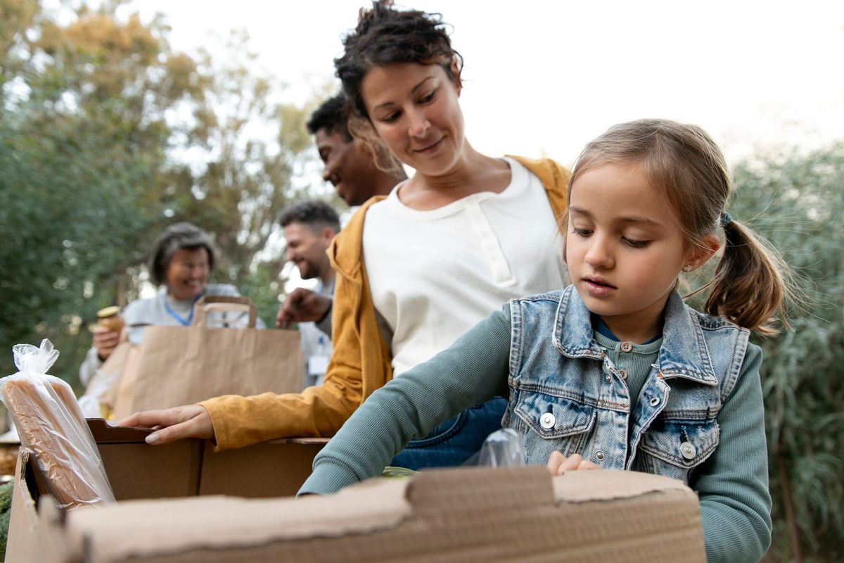 Medium shot volunteers with donations